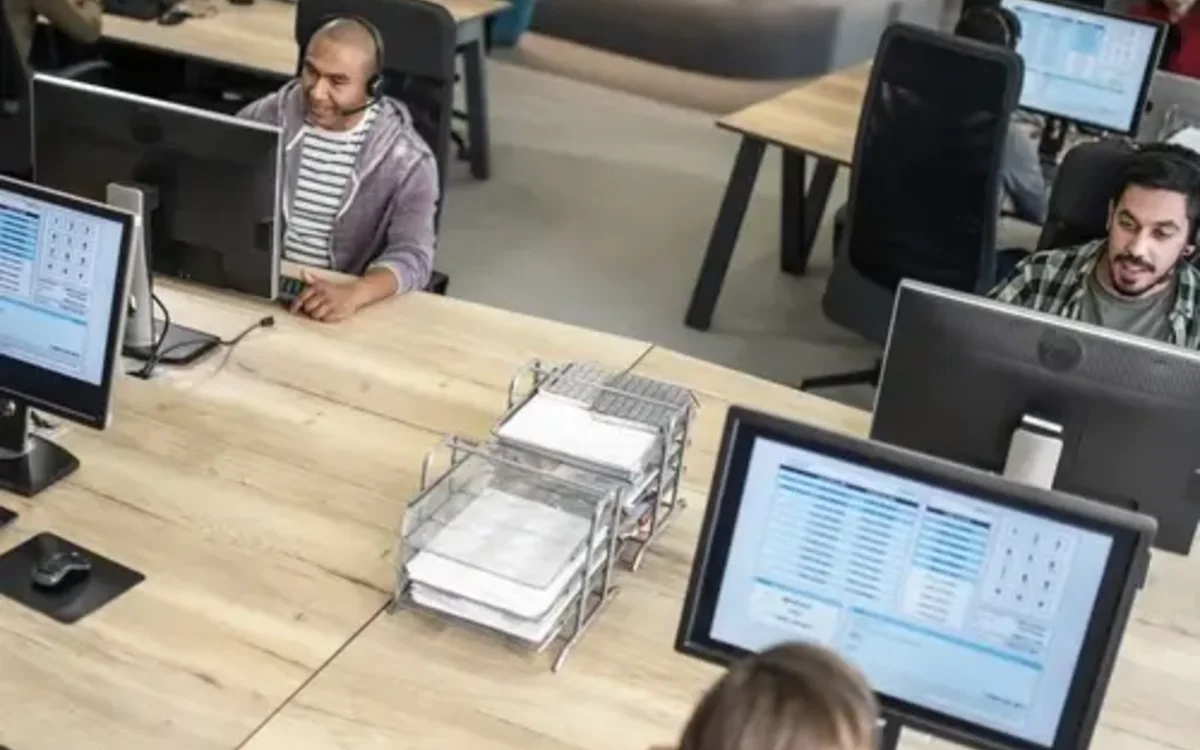 Service desk team working across support systems